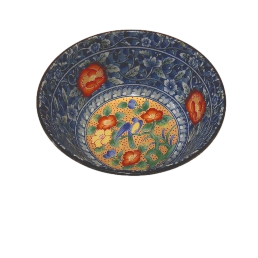 Japanese Rice bowl the color is blue with a bird on the bottom